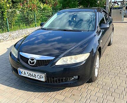 Черный Мазда 6, объемом двигателя 2 л и пробегом 316 тыс. км за 4000 $, фото 3 на Automoto.ua