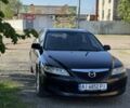 Черный Мазда 6, объемом двигателя 2 л и пробегом 220 тыс. км за 4999 $, фото 2 на Automoto.ua