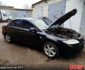 Черный Мазда 6, объемом двигателя 20 л и пробегом 234 тыс. км за 5500 $, фото 6 на Automoto.ua