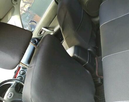 Чорний Мазда 6, об'ємом двигуна 1.8 л та пробігом 211 тис. км за 5200 $, фото 6 на Automoto.ua