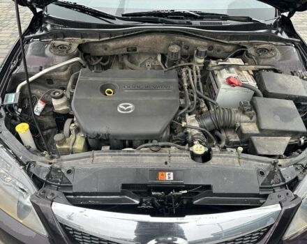 Черный Мазда 6, объемом двигателя 1.8 л и пробегом 315 тыс. км за 4499 $, фото 7 на Automoto.ua