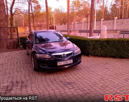 Черный Мазда 6, объемом двигателя 2 л и пробегом 210 тыс. км за 4800 $, фото 1 на Automoto.ua