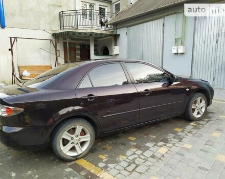 Чорний Мазда 6, об'ємом двигуна 1.8 л та пробігом 211 тис. км за 5200 $, фото 9 на Automoto.ua