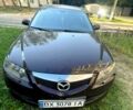 Черный Мазда 6, объемом двигателя 2 л и пробегом 314 тыс. км за 5600 $, фото 1 на Automoto.ua