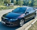Черный Мазда 6, объемом двигателя 2 л и пробегом 216 тыс. км за 5450 $, фото 1 на Automoto.ua