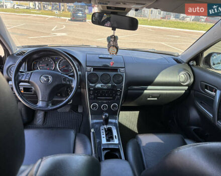 Черный Мазда 6, объемом двигателя 2 л и пробегом 191 тыс. км за 5300 $, фото 1 на Automoto.ua