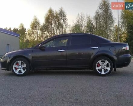 Черный Мазда 6, объемом двигателя 2 л и пробегом 315 тыс. км за 4250 $, фото 6 на Automoto.ua