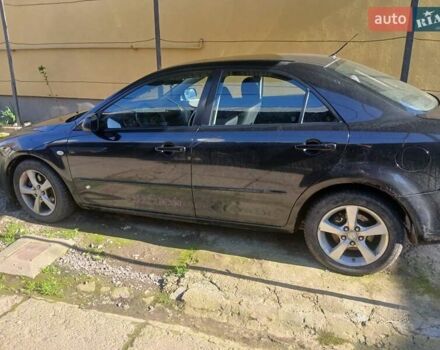 Черный Мазда 6, объемом двигателя 2 л и пробегом 357 тыс. км за 2500 $, фото 2 на Automoto.ua