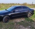Черный Мазда 6, объемом двигателя 1.8 л и пробегом 333 тыс. км за 3750 $, фото 1 на Automoto.ua