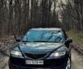 Черный Мазда 6, объемом двигателя 1.8 л и пробегом 259 тыс. км за 3500 $, фото 1 на Automoto.ua