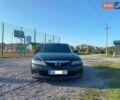 Черный Мазда 6, объемом двигателя 2 л и пробегом 338 тыс. км за 4500 $, фото 1 на Automoto.ua