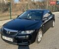 Черный Мазда 6, объемом двигателя 2 л и пробегом 318 тыс. км за 3000 $, фото 1 на Automoto.ua