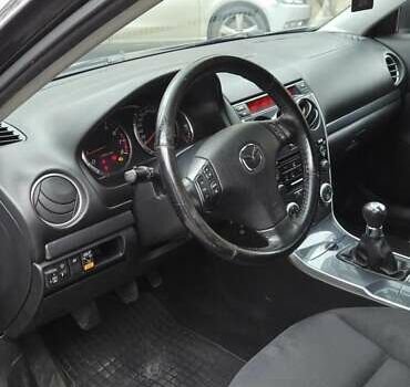 Черный Мазда 6, объемом двигателя 2 л и пробегом 266 тыс. км за 5200 $, фото 16 на Automoto.ua