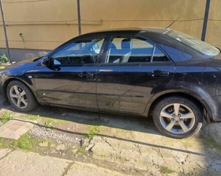 Черный Мазда 6, объемом двигателя 2 л и пробегом 360 тыс. км за 2400 $, фото 4 на Automoto.ua