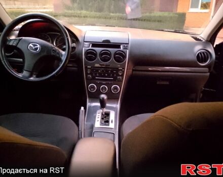 Черный Мазда 6, объемом двигателя 2 л и пробегом 210 тыс. км за 4800 $, фото 7 на Automoto.ua