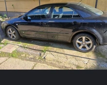 Черный Мазда 6, объемом двигателя 2 л и пробегом 360 тыс. км за 2400 $, фото 1 на Automoto.ua