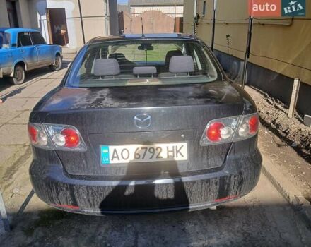 Черный Мазда 6, объемом двигателя 2 л и пробегом 357 тыс. км за 2500 $, фото 1 на Automoto.ua