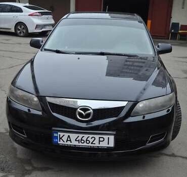 Черный Мазда 6, объемом двигателя 2 л и пробегом 266 тыс. км за 5200 $, фото 1 на Automoto.ua