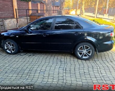 Черный Мазда 6, объемом двигателя 2 л и пробегом 210 тыс. км за 4800 $, фото 4 на Automoto.ua