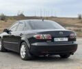 Черный Мазда 6, объемом двигателя 2 л и пробегом 266 тыс. км за 4950 $, фото 1 на Automoto.ua