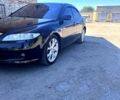 Черный Мазда 6, объемом двигателя 2 л и пробегом 260 тыс. км за 5500 $, фото 1 на Automoto.ua