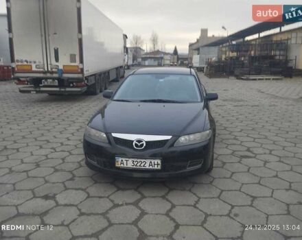 Черный Мазда 6, объемом двигателя 2 л и пробегом 268 тыс. км за 6300 $, фото 1 на Automoto.ua