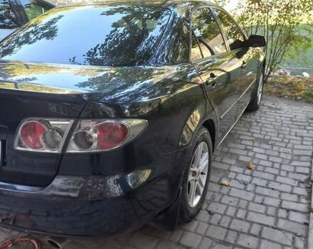 Черный Мазда 6, объемом двигателя 2 л и пробегом 269 тыс. км за 5999 $, фото 1 на Automoto.ua