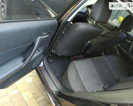 Чорний Мазда 6, об'ємом двигуна 1.8 л та пробігом 211 тис. км за 5200 $, фото 5 на Automoto.ua