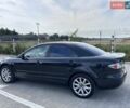 Черный Мазда 6, объемом двигателя 2 л и пробегом 240 тыс. км за 4200 $, фото 1 на Automoto.ua