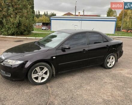 Черный Мазда 6, объемом двигателя 2 л и пробегом 146 тыс. км за 4200 $, фото 2 на Automoto.ua