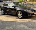 Черный Мазда 6, объемом двигателя 2 л и пробегом 350 тыс. км за 4350 $, фото 4 на Automoto.ua