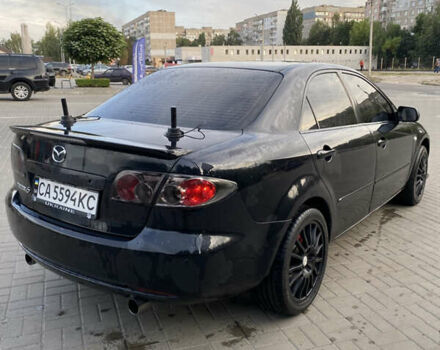 Черный Мазда 6, объемом двигателя 2 л и пробегом 320 тыс. км за 5350 $, фото 1 на Automoto.ua
