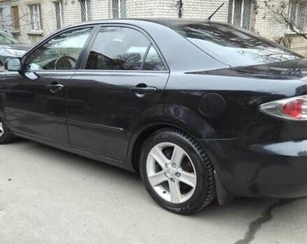 Черный Мазда 6, объемом двигателя 2 л и пробегом 266 тыс. км за 5200 $, фото 5 на Automoto.ua