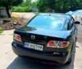 Чорний Мазда 6, об'ємом двигуна 2 л та пробігом 318 тис. км за 5000 $, фото 1 на Automoto.ua