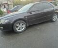 Черный Мазда 6, объемом двигателя 2 л и пробегом 250 тыс. км за 3800 $, фото 1 на Automoto.ua