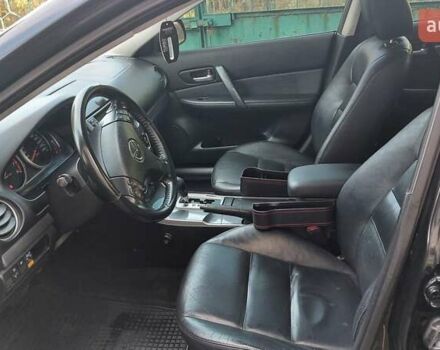 Черный Мазда 6, объемом двигателя 2 л и пробегом 163 тыс. км за 6500 $, фото 8 на Automoto.ua