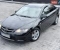 Черный Мазда 6, объемом двигателя 2 л и пробегом 187 тыс. км за 5700 $, фото 1 на Automoto.ua
