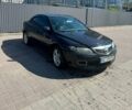 Черный Мазда 6, объемом двигателя 2 л и пробегом 302 тыс. км за 6500 $, фото 1 на Automoto.ua