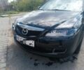 Черный Мазда 6, объемом двигателя 2 л и пробегом 193 тыс. км за 6698 $, фото 1 на Automoto.ua