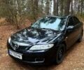 Черный Мазда 6, объемом двигателя 2 л и пробегом 258 тыс. км за 6300 $, фото 1 на Automoto.ua