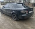 Черный Мазда 6, объемом двигателя 1.8 л и пробегом 322 тыс. км за 4000 $, фото 1 на Automoto.ua
