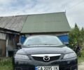 Черный Мазда 6, объемом двигателя 2 л и пробегом 231 тыс. км за 6000 $, фото 1 на Automoto.ua