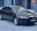 Черный Мазда 6, объемом двигателя 1.8 л и пробегом 243 тыс. км за 5800 $, фото 1 на Automoto.ua