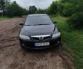 Черный Мазда 6, объемом двигателя 1.8 л и пробегом 240 тыс. км за 4900 $, фото 1 на Automoto.ua