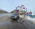 Черный Мазда 6, объемом двигателя 2 л и пробегом 239 тыс. км за 5600 $, фото 1 на Automoto.ua