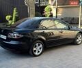 Черный Мазда 6, объемом двигателя 2 л и пробегом 185 тыс. км за 5800 $, фото 1 на Automoto.ua