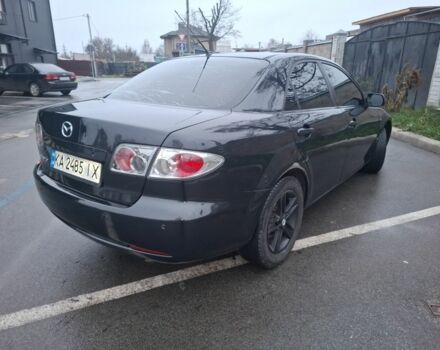 Черный Мазда 6, объемом двигателя 2 л и пробегом 335 тыс. км за 4650 $, фото 1 на Automoto.ua