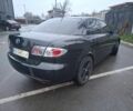 Черный Мазда 6, объемом двигателя 2 л и пробегом 335 тыс. км за 4650 $, фото 1 на Automoto.ua