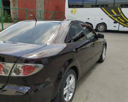 Черный Мазда 6, объемом двигателя 2 л и пробегом 235 тыс. км за 5350 $, фото 5 на Automoto.ua