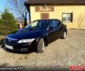 Черный Мазда 6, объемом двигателя 2 л и пробегом 225 тыс. км за 4900 $, фото 1 на Automoto.ua